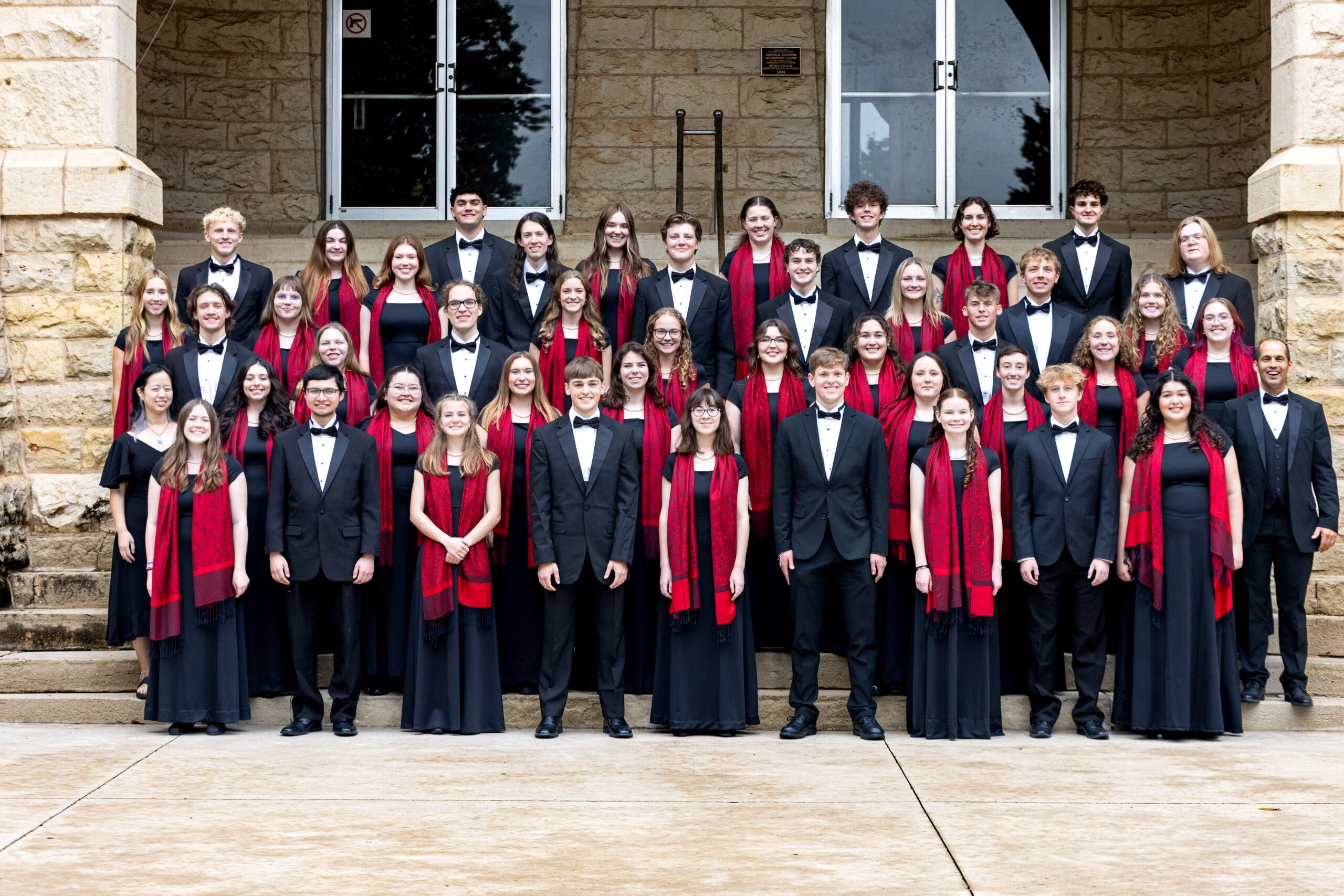 Concert Choir in concert dress on the Ad Building steps